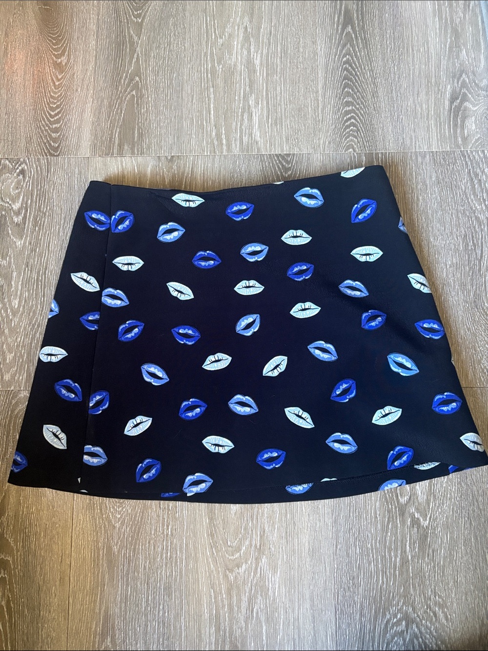 Zara Black Mini Skirt with Blue & White Lip Print